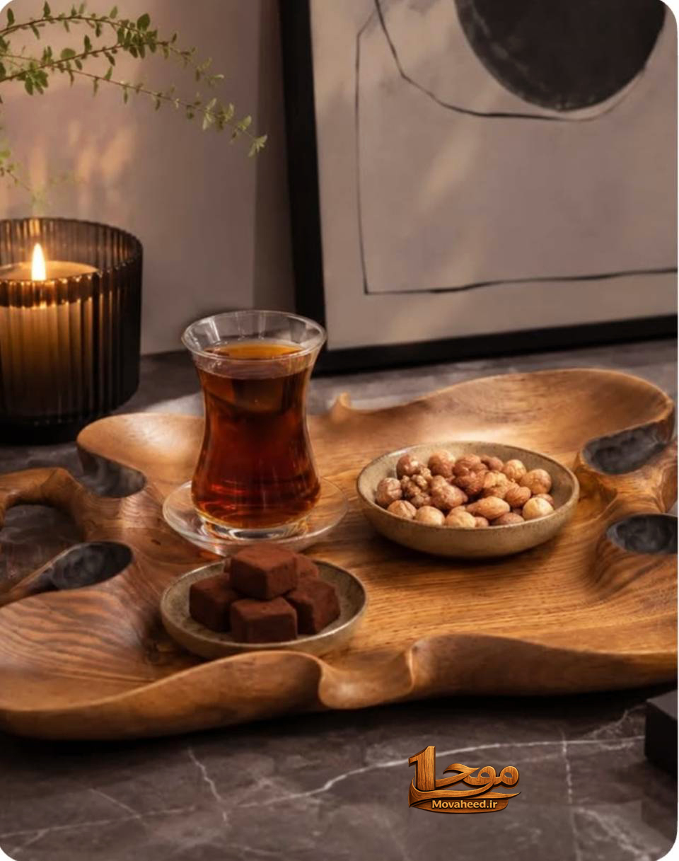 حمایت یعنی دیده شدنِ هنر. و هر لایک، یعنی یک دلگرمی برای ادامه‌ی خلاقیت.🍃❤️  ☕️ سینی چای دست‌تراش برند آرن از چوب گردو، یک‌تکه و کاملاً طبیعی ساخته شده؛ با دفرمگی‌های خاص و فرم منحصربه‌فرد که از دل خود چوب شکل گرفته است 🤎